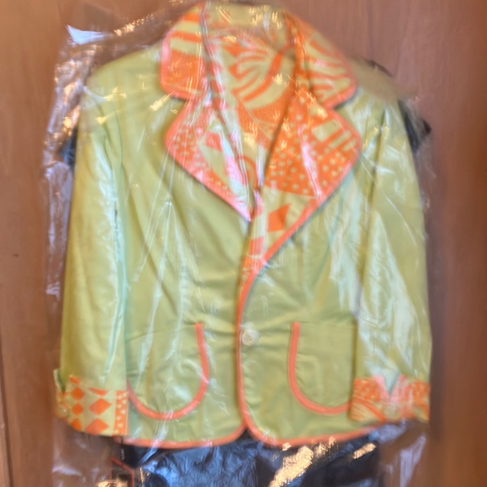 New with tag’s. Reversible jacket with vibrant colors of green and orange.